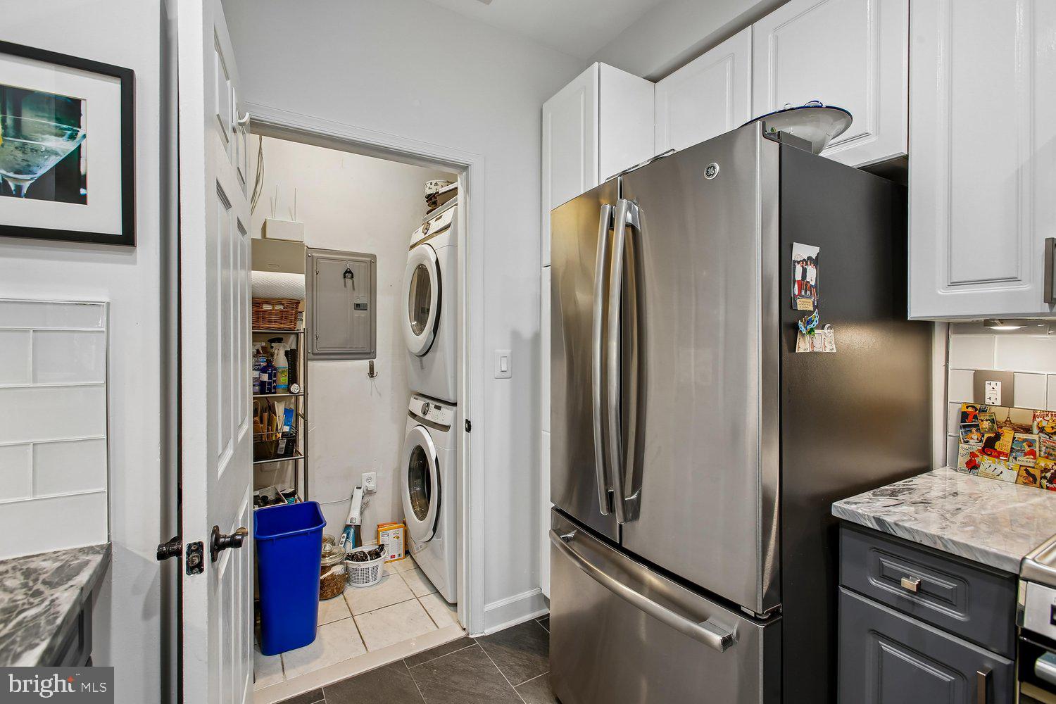 1855 Stratford Park Place, Unit 103 Reston, VA 20190 - Photo 13 of 49 Laundry off of Kitchen.