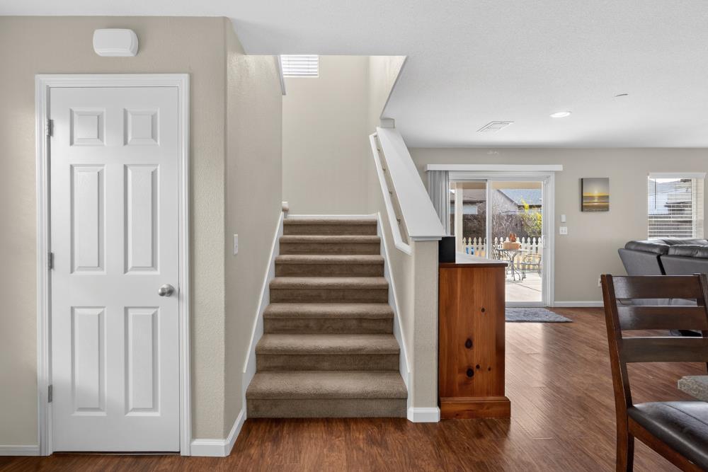 7467 Garden Ridge Way Sacramento, CA 95829 - Photo 20 of 54 a view of entryway with wooden floor and stairs