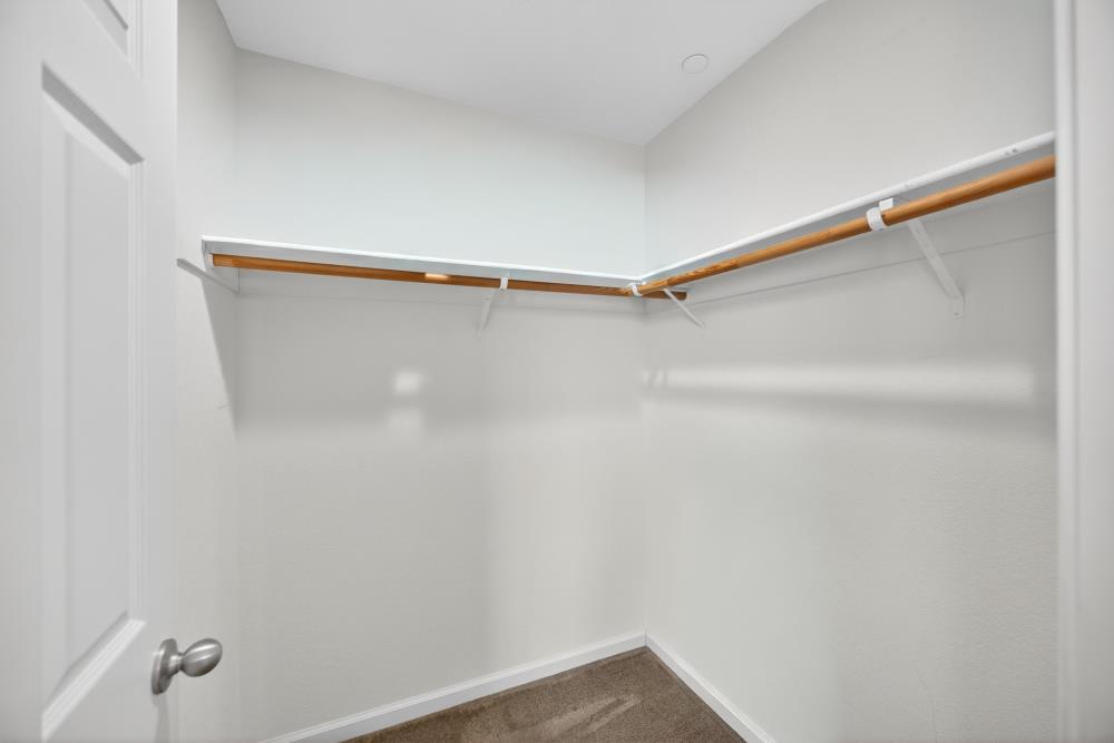 7467 Garden Ridge Way Sacramento, CA 95829 - Photo 33 of 54 a view of small space with racks on the wall