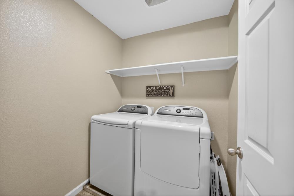 7467 Garden Ridge Way Sacramento, CA 95829 - Photo 34 of 54 a utility room with dryer and washer