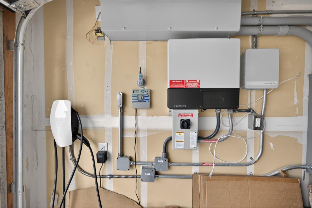 7467 Garden Ridge Way Sacramento, CA 95829 - Photo 39 of 54 a table with chairs and white walls