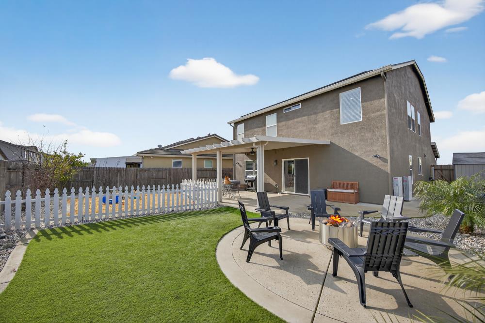 7467 Garden Ridge Way Sacramento, CA 95829 - Photo 46 of 54 a view of a house with backyard and sitting area
