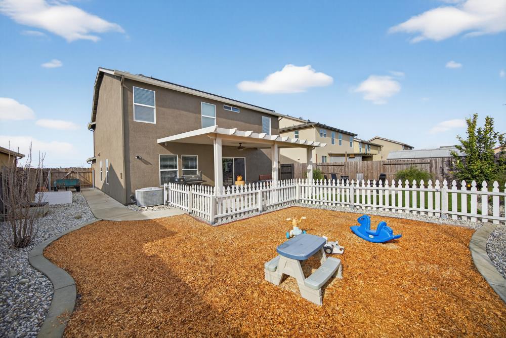 7467 Garden Ridge Way Sacramento, CA 95829 - Photo 48 of 54 a view of a house with a swimming pool