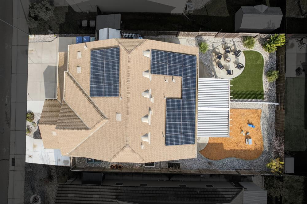 7467 Garden Ridge Way Sacramento, CA 95829 - Photo 50 of 54 a front view of house with a garden