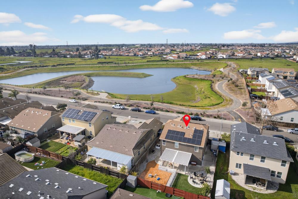 7467 Garden Ridge Way Sacramento, CA 95829 - Photo 51 of 54 an aerial view of a building with swimming pool and ocean view