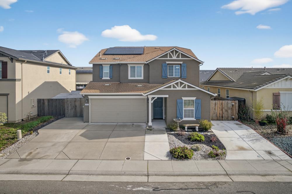 7467 Garden Ridge Way Sacramento, CA 95829 - Photo 53 of 54 a front view of a house with yard