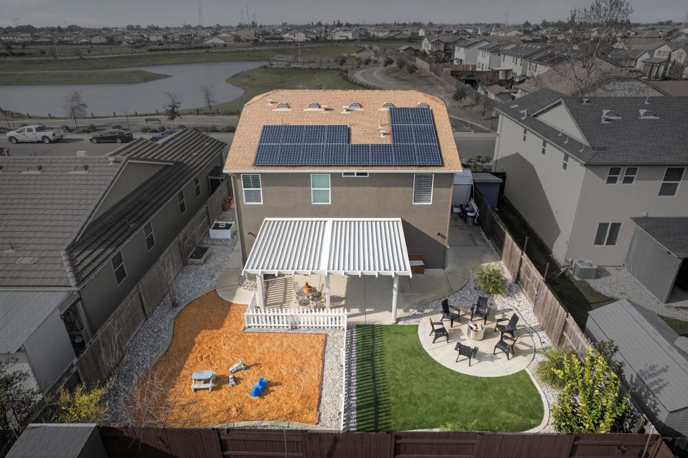 7467 Garden Ridge Way Sacramento, CA 95829 - Photo 54 of 54 an aerial view of house with yard swimming pool and outdoor seating