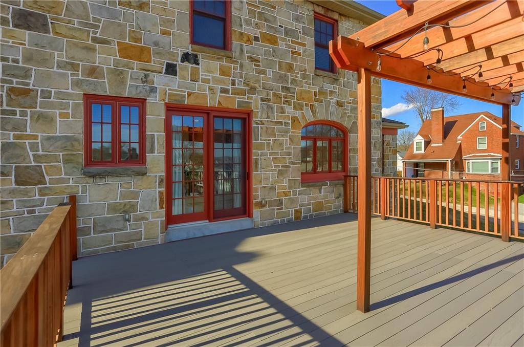 801 Main Street Coraopolis, PA 15108 - Photo 23 of 25 a view of a brick house with an outdoor space