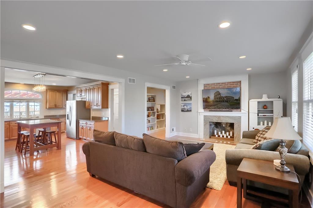 801 Main Street Coraopolis, PA 15108 - Photo 4 of 25 a living room with furniture and a fireplace
