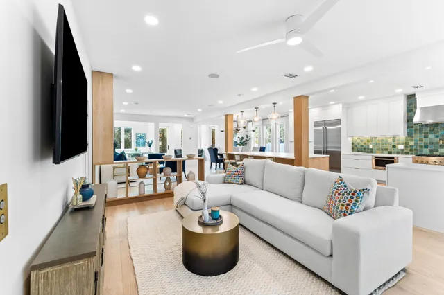 a living room with furniture and a window