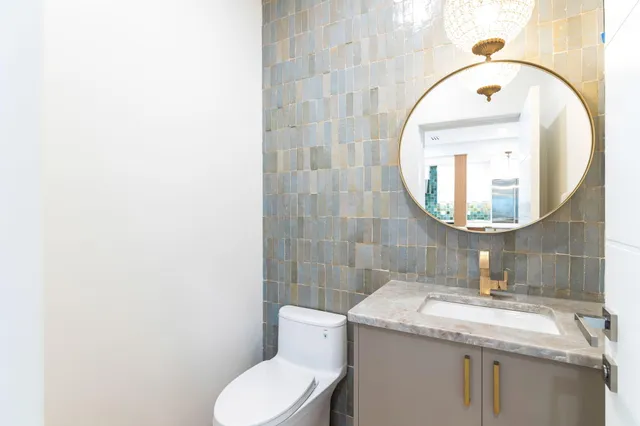 a view of a front door and wooden floor