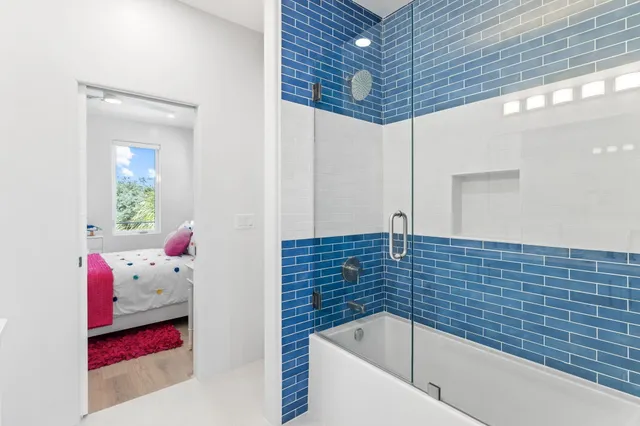 a front view of house with yard and swimming pool