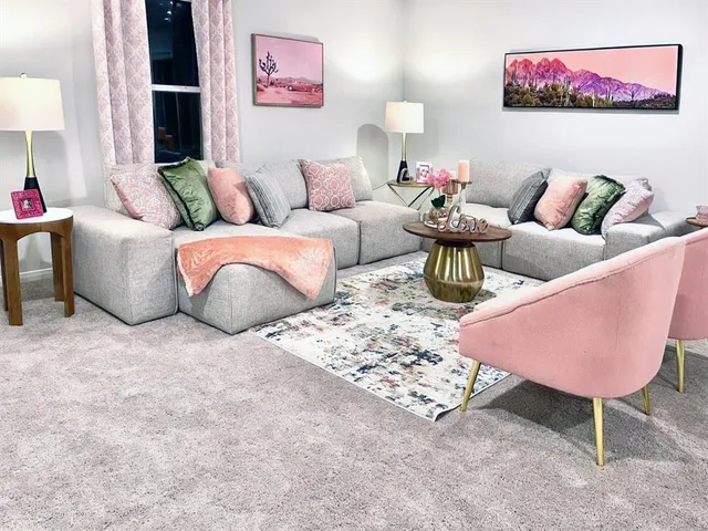 a living room with furniture and a couch