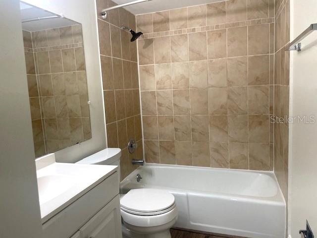 4800 Rilma Avenue, Unit 141 Sarasota, FL 34234 - Photo 10 of 19 a bathroom with a bathtub and a shower