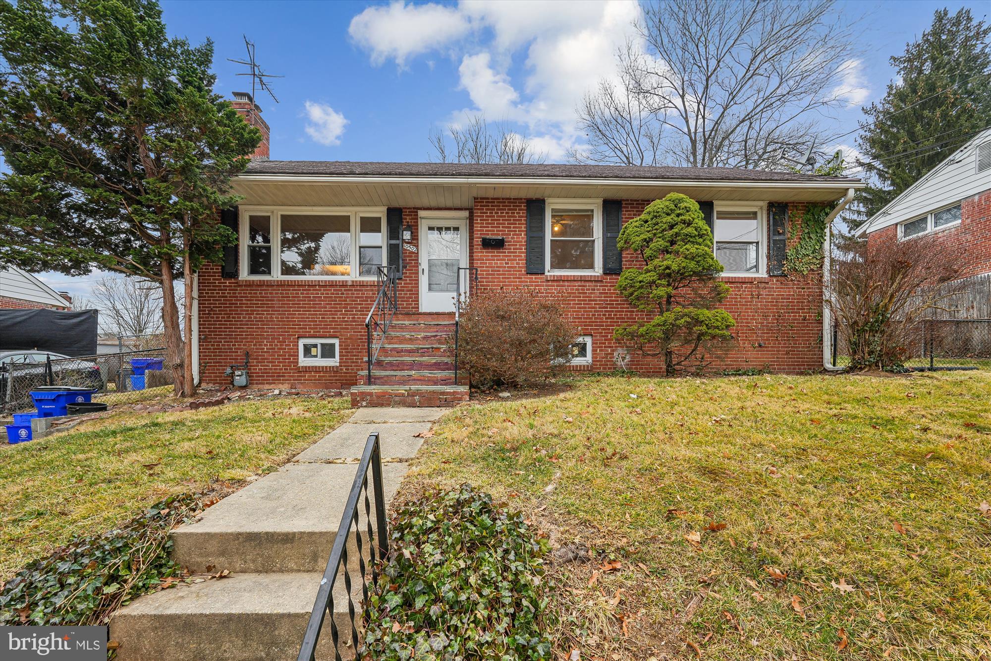 10502 Glenhaven Drive Silver Spring, MD 20902 - Photo 1 of 38 a front view of house with yard