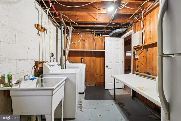 a bathroom with a sink and a window