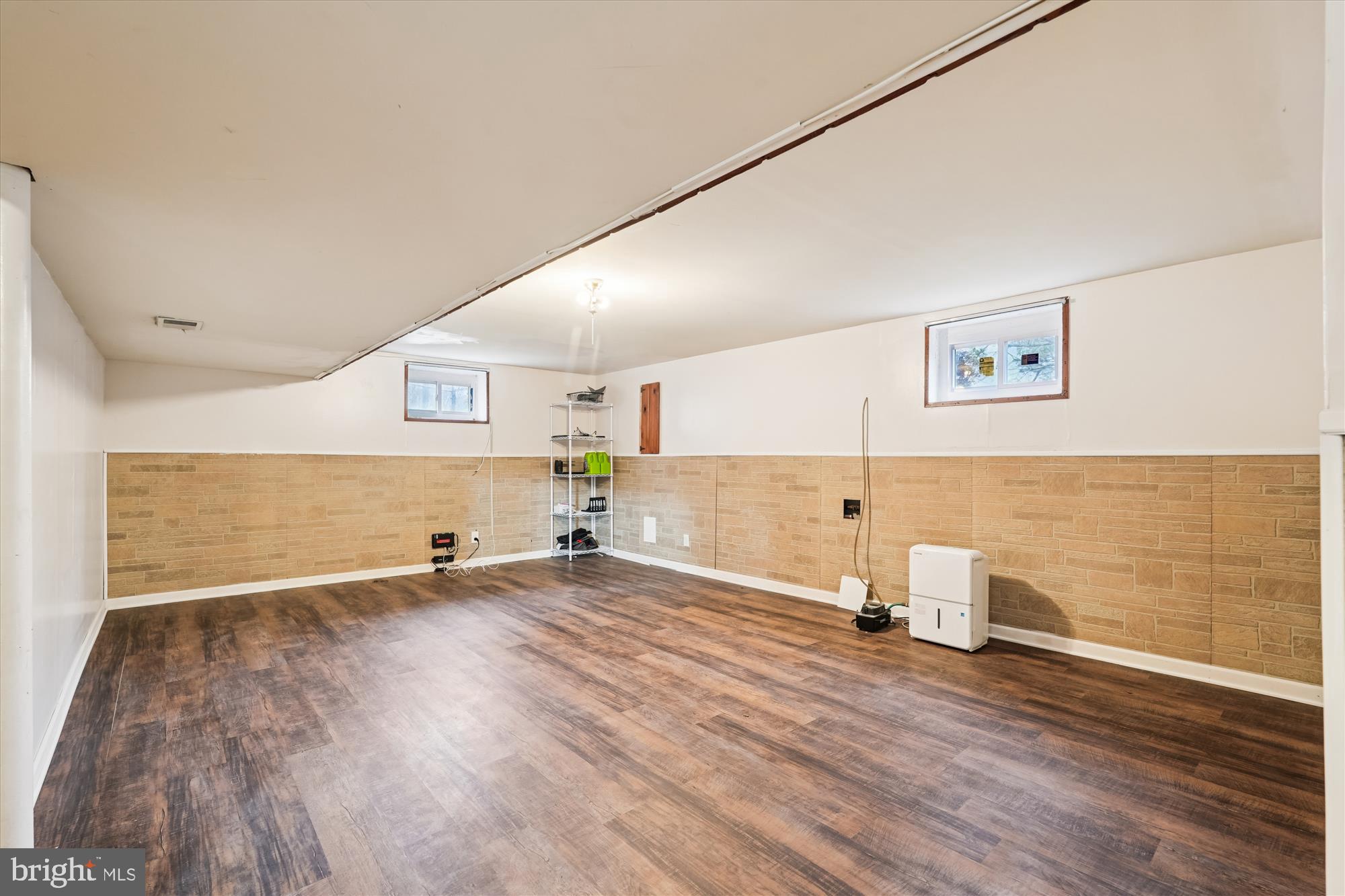 10502 Glenhaven Drive Silver Spring, MD 20902 - Photo 25 of 38 a view of empty room with wooden floor