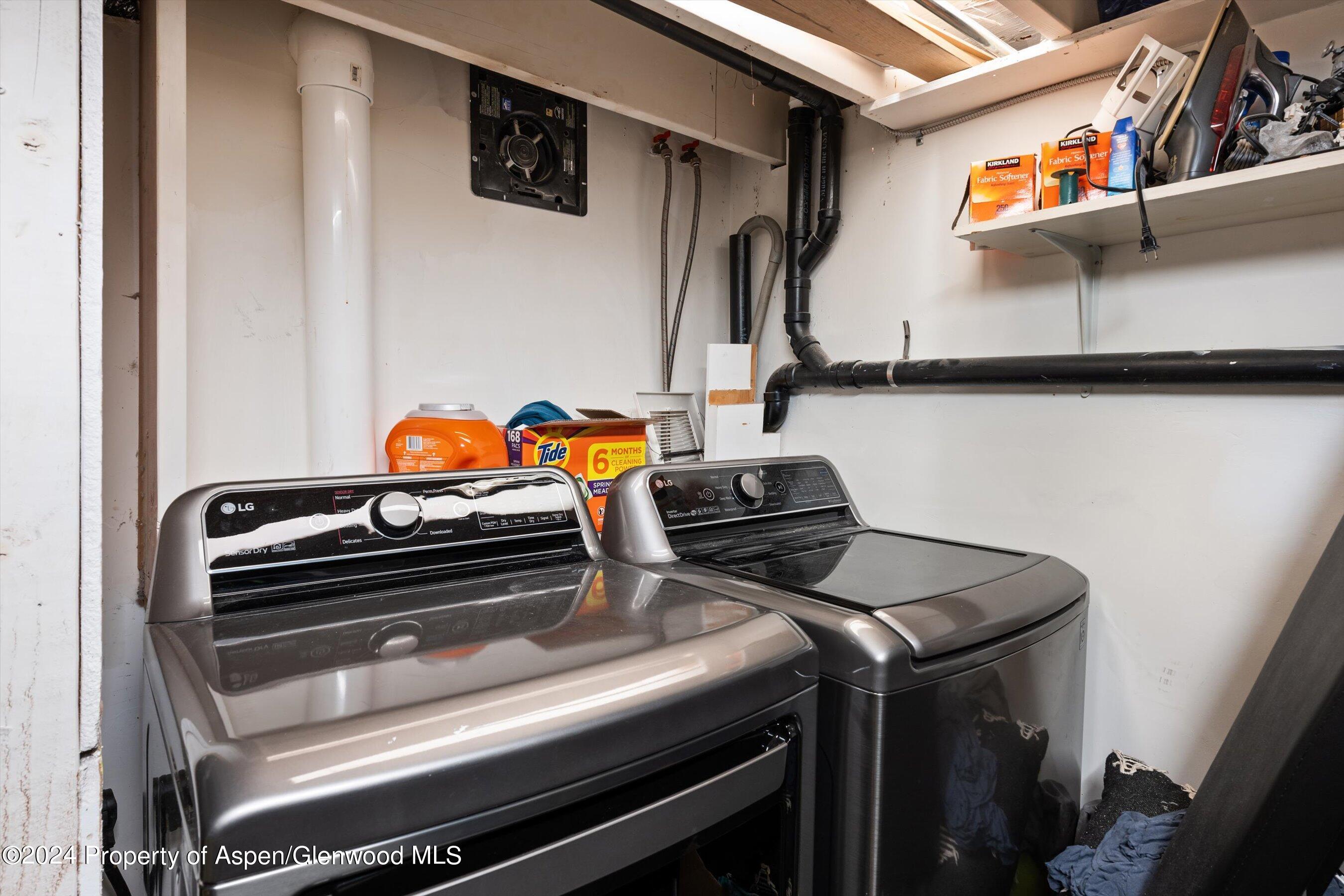 331 West Main Street, Unit B Aspen, CO 81611 - Photo 19 of 21 a kitchen with a stove and a microwave