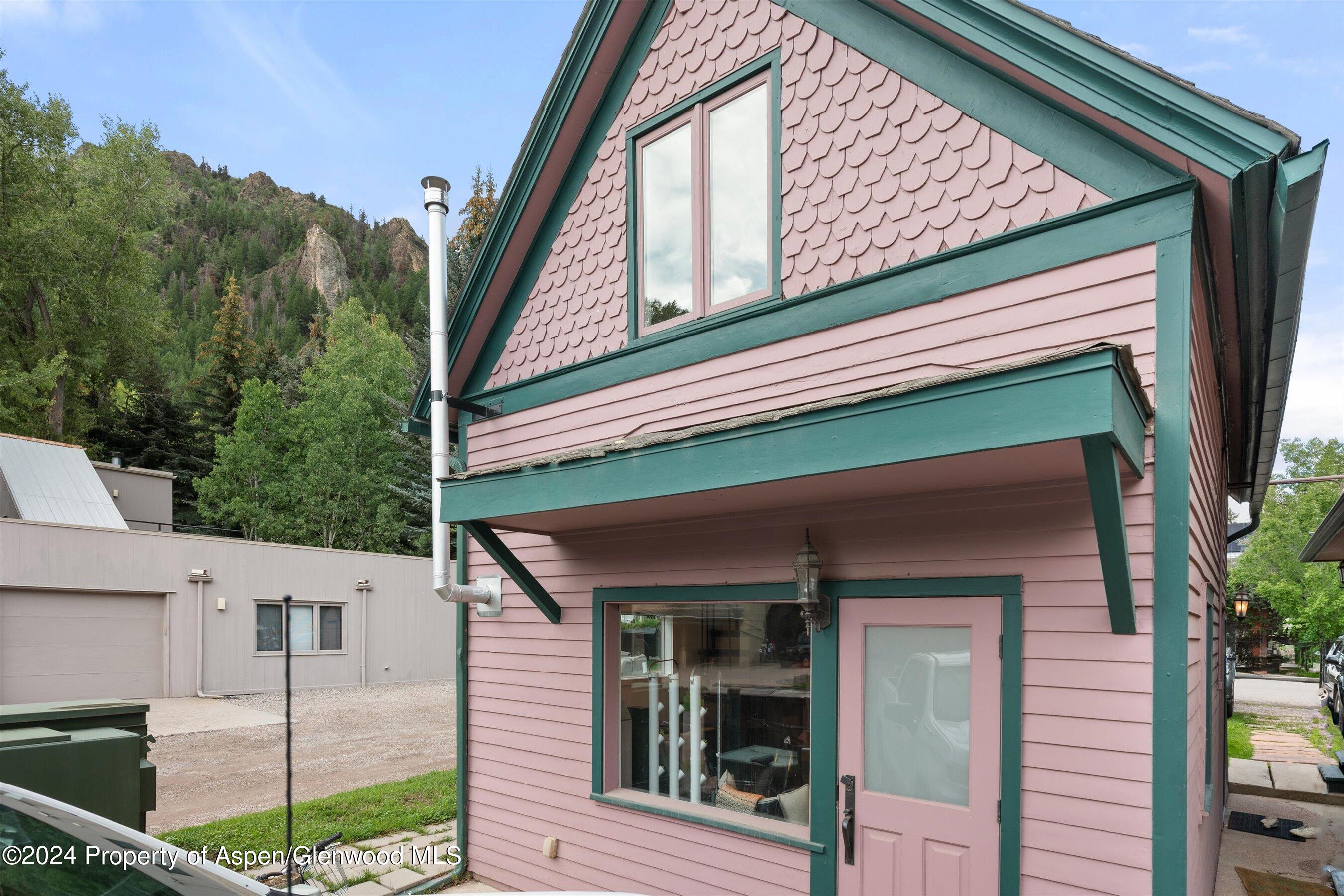 331 West Main Street, Unit B Aspen, CO 81611 - Photo 20 of 21 a front view of a house with a yard