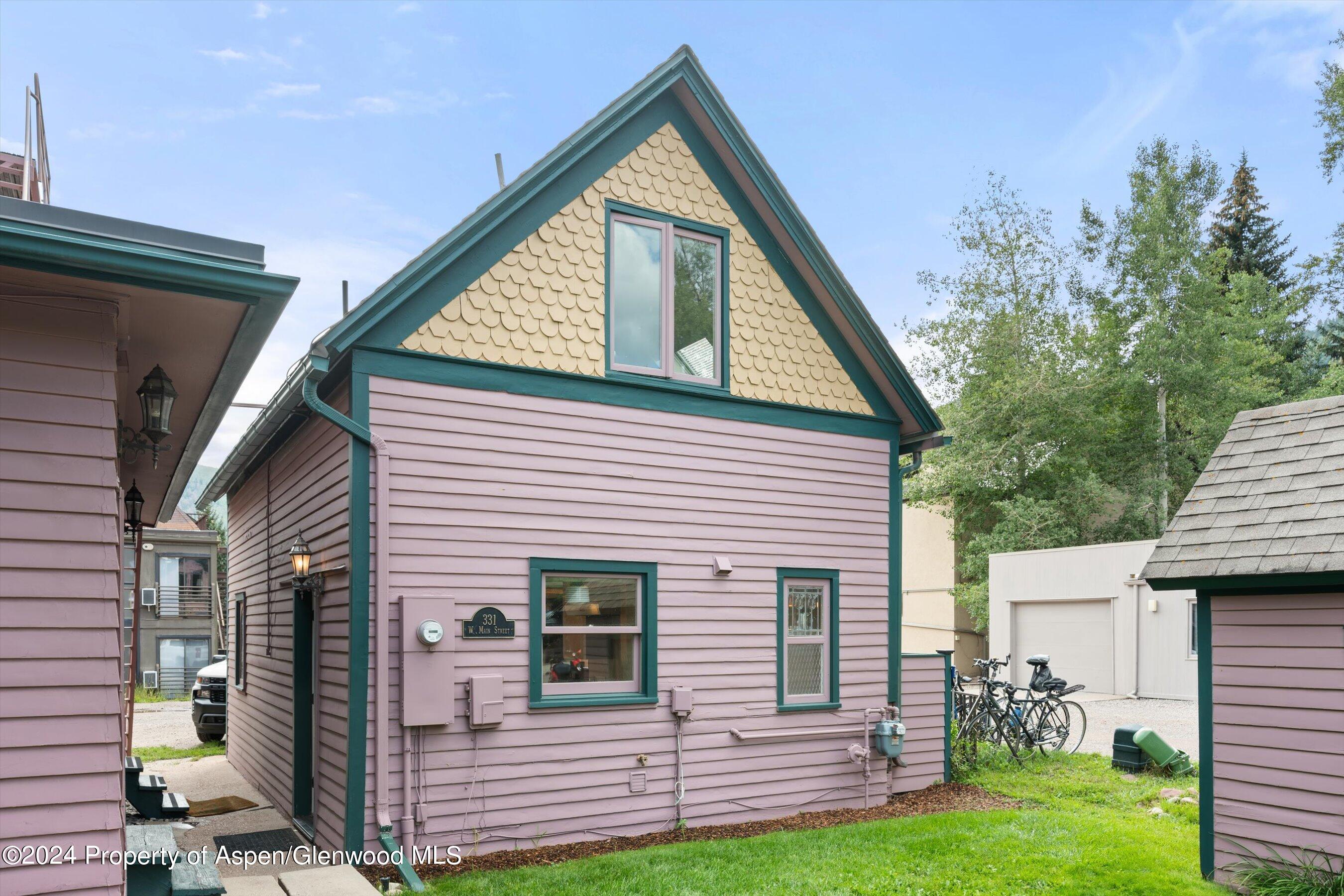 331 West Main Street, Unit B Aspen, CO 81611 - Photo 21 of 21 a front view of a house with a yard