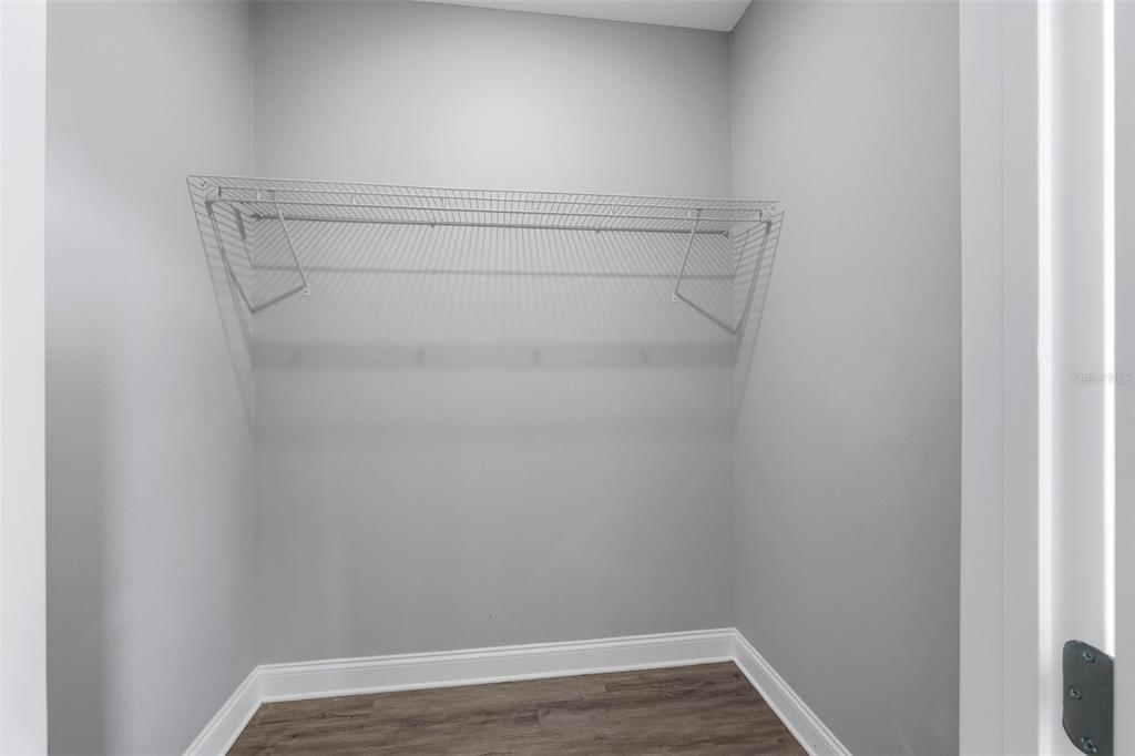 314 Colonade Court, Unit B Kissimmee, FL 34758 - Photo 17 of 24 a view of small space with racks on the wall