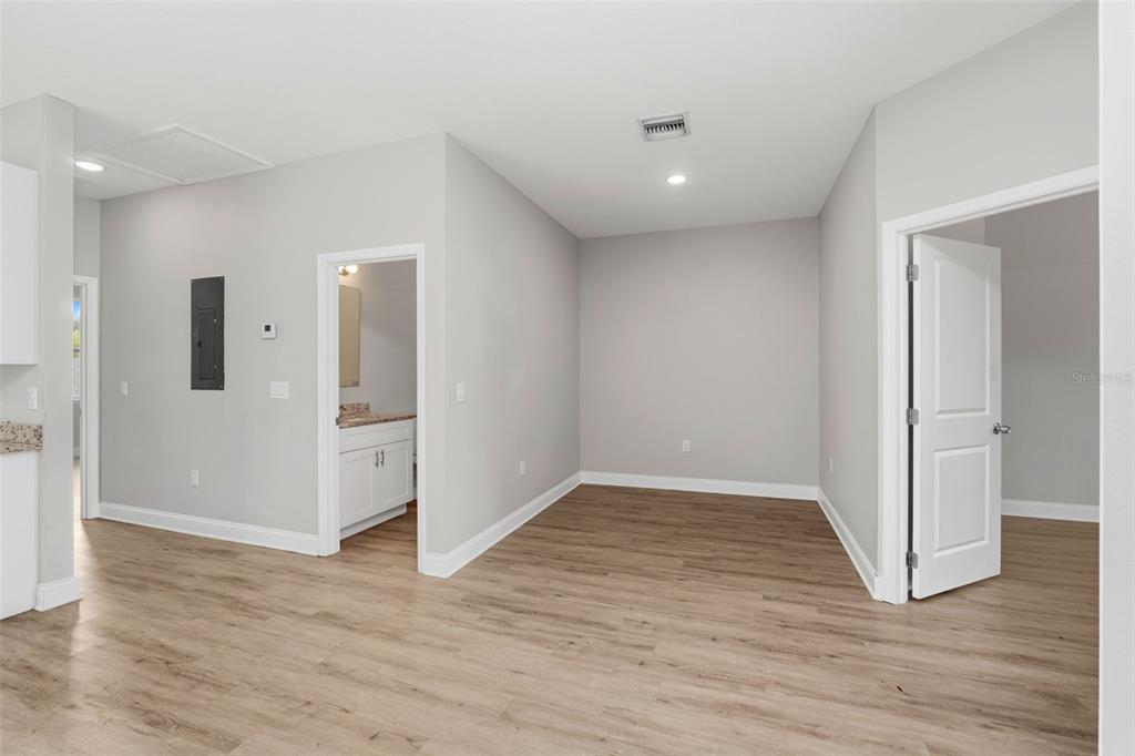 314 Colonade Court, Unit B Kissimmee, FL 34758 - Photo 5 of 24 a view of a livingroom with wooden floor