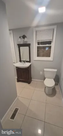 a living room with a couch and a table