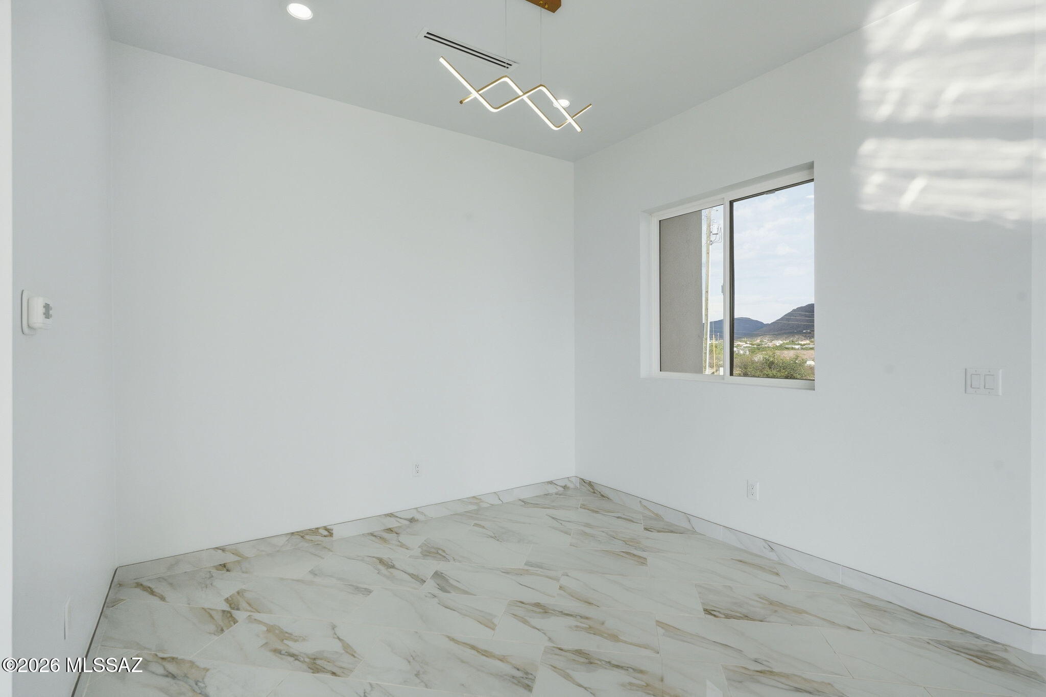 1786 Peralta Court Rio Rico, AZ 85648 - Photo 43 of 50 a view of a room with a window