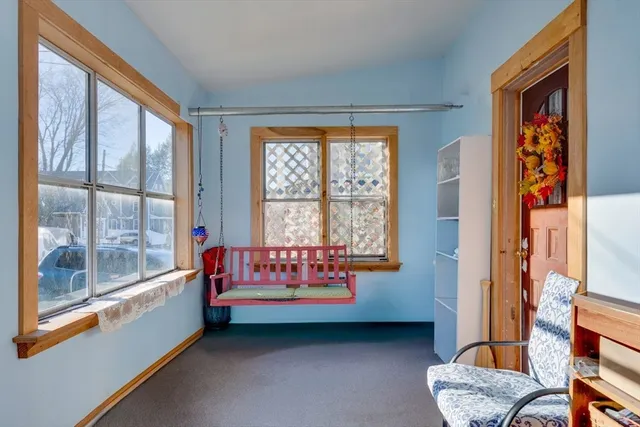 a bedroom with furniture and a bathtub