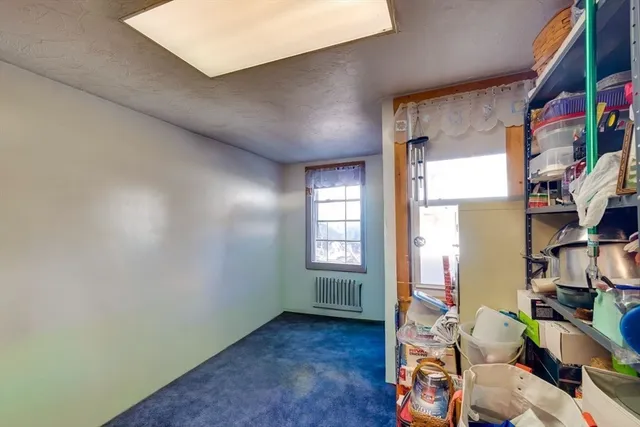 a room with furniture and a window