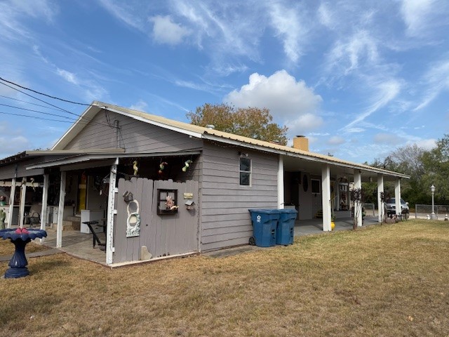 508 East Thornton Street Three Rivers, TX 78071 - Photo 16 of 17 a view of a house with patio