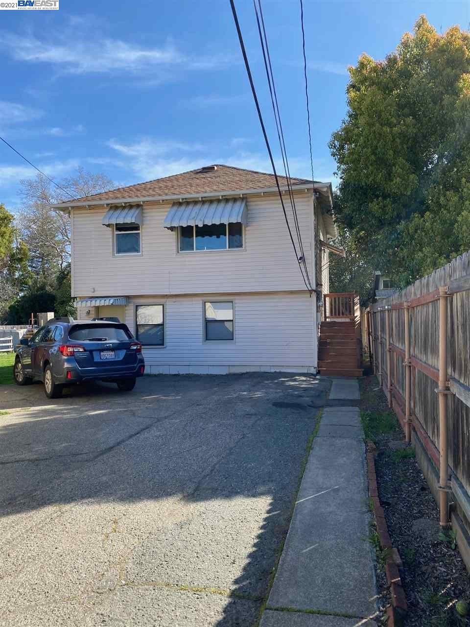 1830 Scott Road Concord, CA 94519 - Photo 1 of 1 a view of a car park in front of house