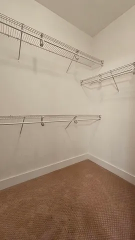 a view of a room with racks on the wall