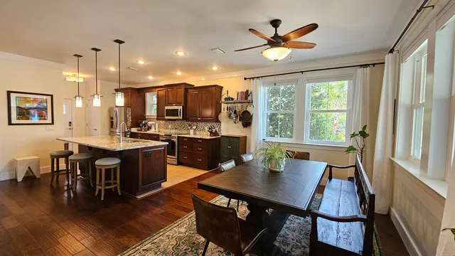 a view of kitchen with furniture and a table