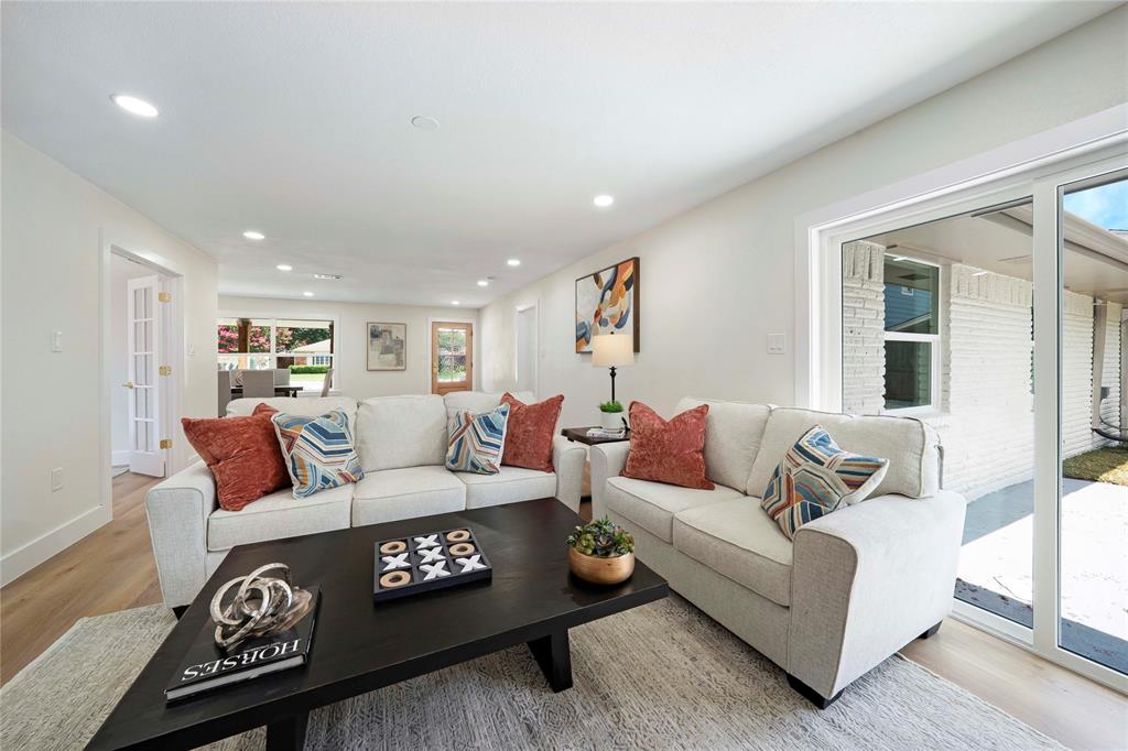 10416 Church Road Dallas, TX 75238 - Photo 11 of 36 a living room with furniture and a couch