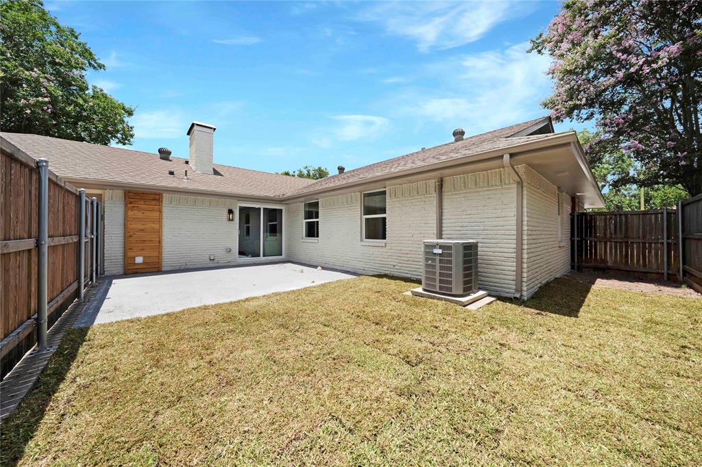 10416 Church Road Dallas, TX 75238 - Photo 34 of 36 a view of a house with wooden fence