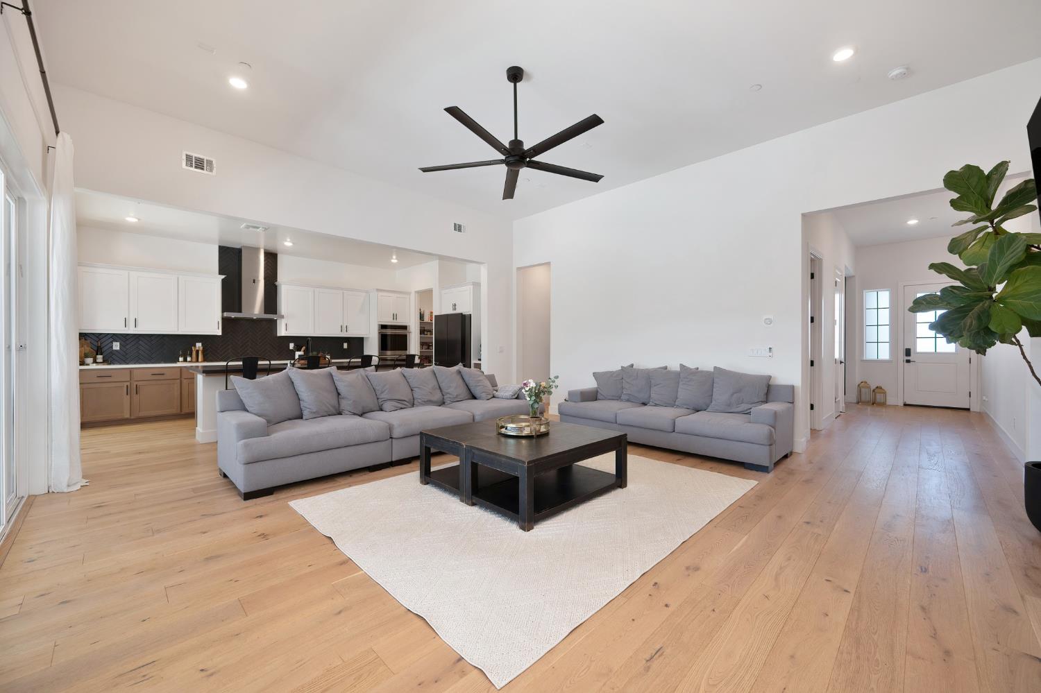 5085 Pryor Drive Rescue, CA 95672 - Photo 14 of 50 a living room with furniture and a wooden floor