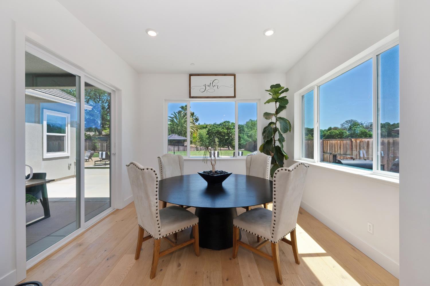5085 Pryor Drive Rescue, CA 95672 - Photo 19 of 50 a view of a dining room with furniture window and wooden floor