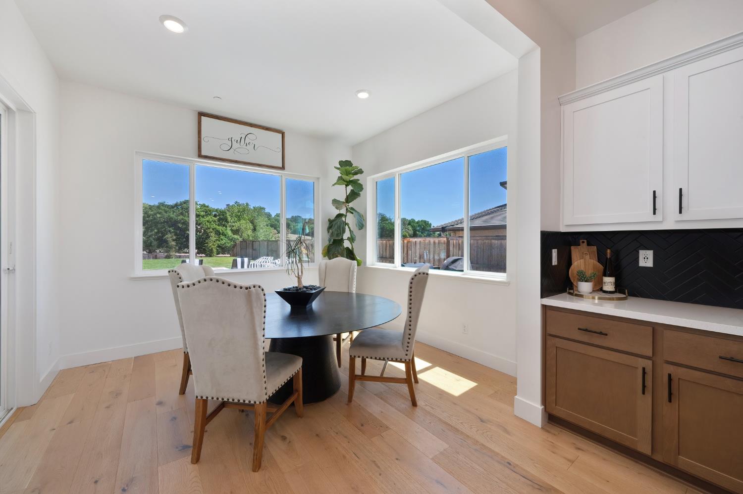 5085 Pryor Drive Rescue, CA 95672 - Photo 20 of 50 a dining room with wooden floor and a window