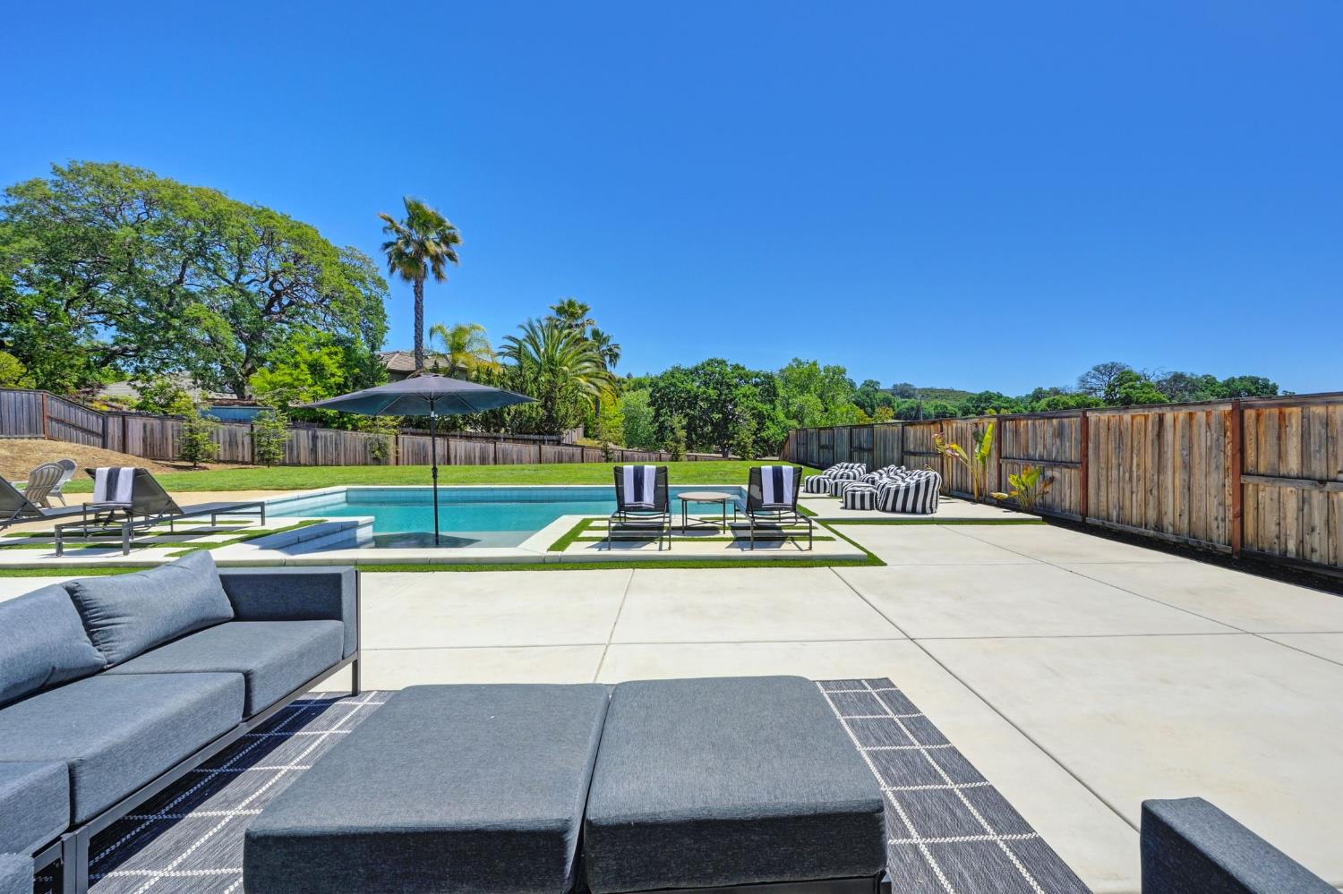 5085 Pryor Drive Rescue, CA 95672 - Photo 25 of 50 a view of a swimming pool with a patio