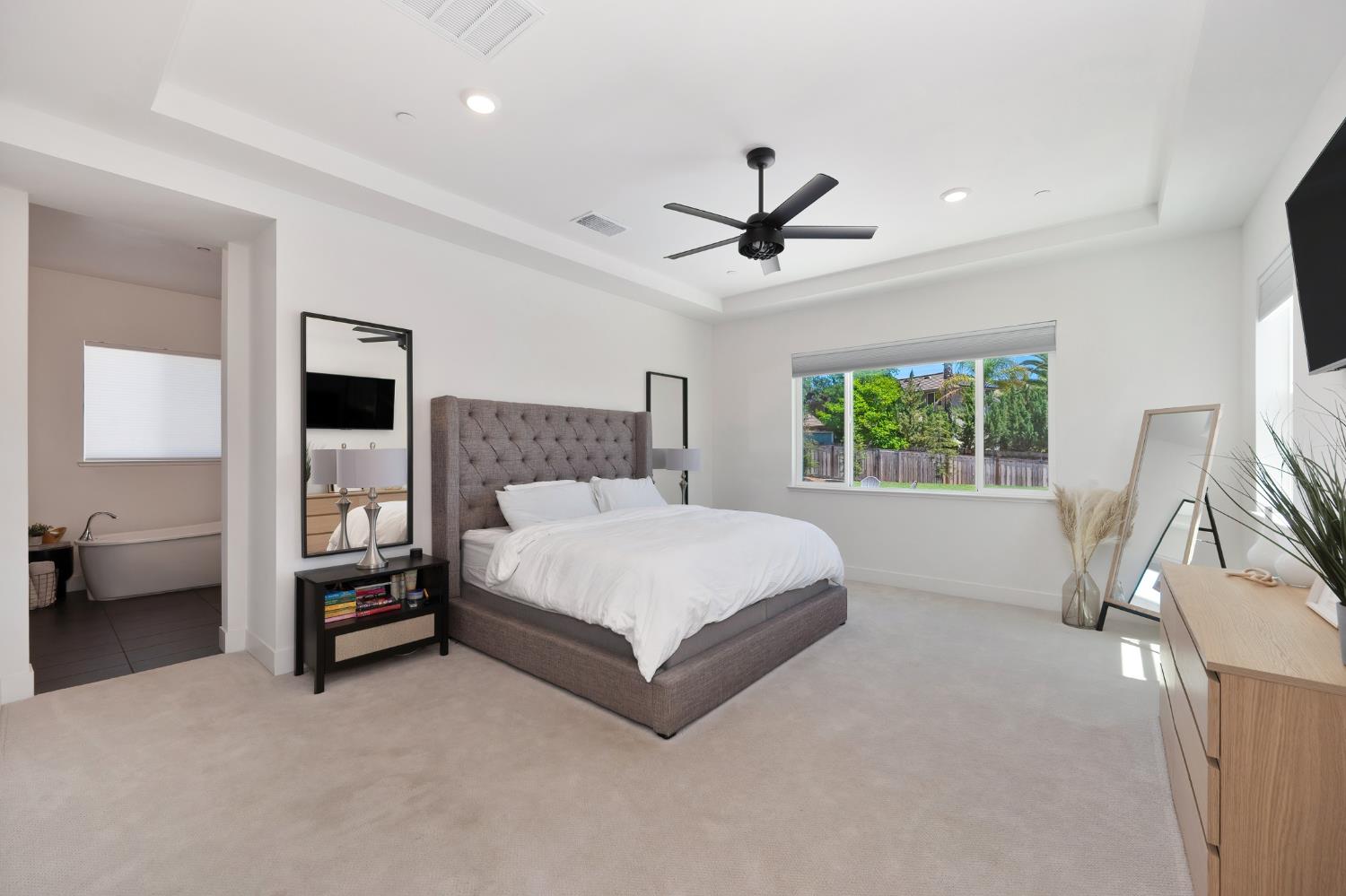 5085 Pryor Drive Rescue, CA 95672 - Photo 27 of 50 a spacious bedroom with a bed and a large window