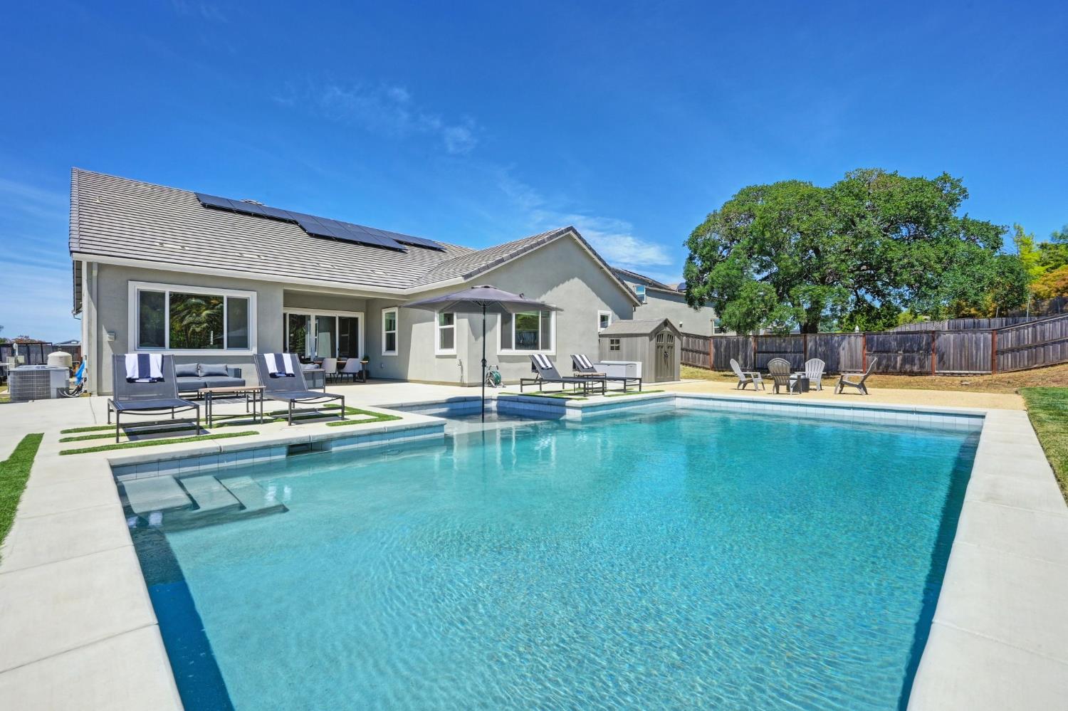 5085 Pryor Drive Rescue, CA 95672 - Photo 27 of 50 a view of a patio with swimming pool table and chairs
