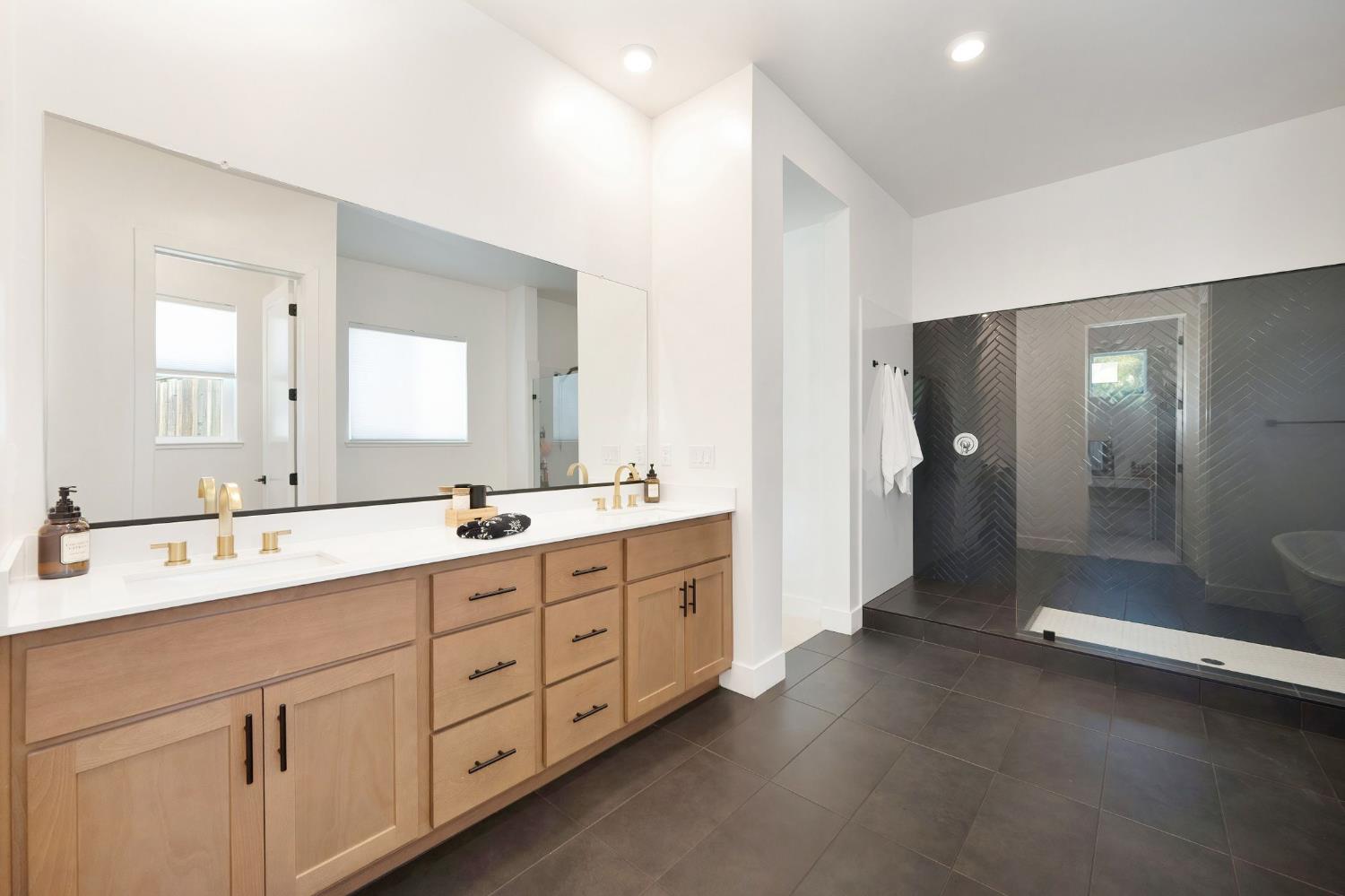 5085 Pryor Drive Rescue, CA 95672 - Photo 31 of 50 a bathroom with a double vanity sink mirror double and shower