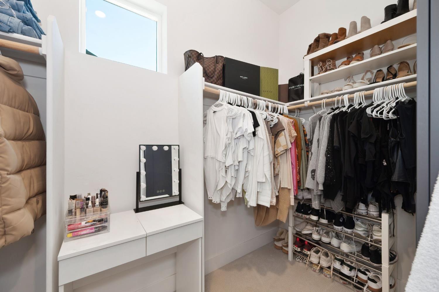 5085 Pryor Drive Rescue, CA 95672 - Photo 35 of 50 a view of walk in closet with clothes and shoes