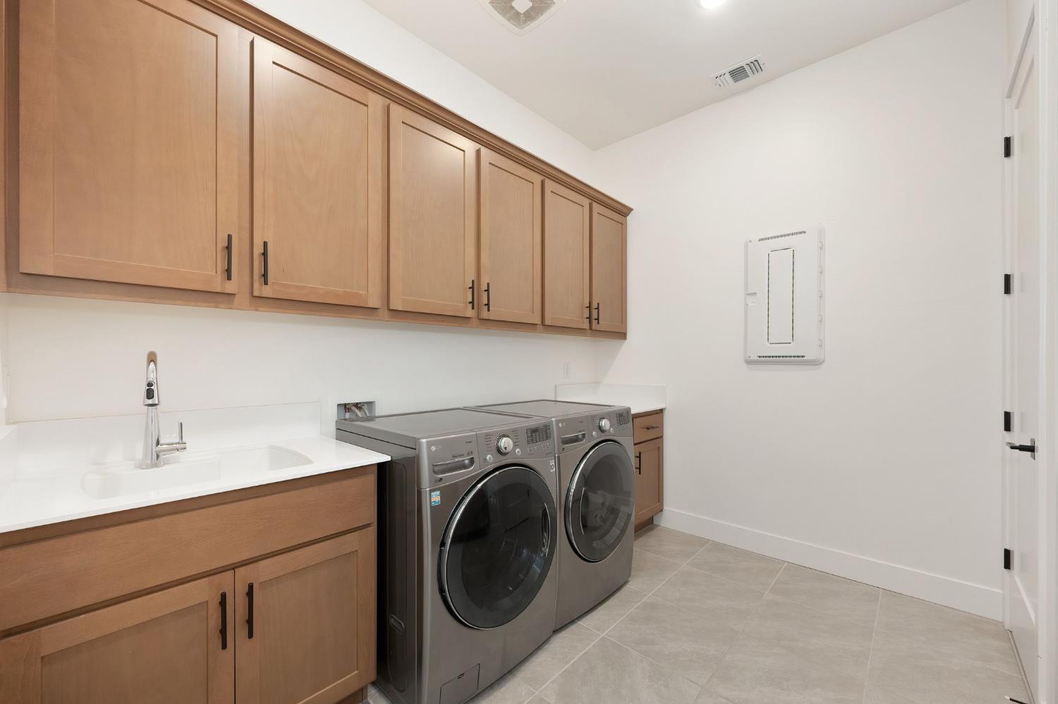 5085 Pryor Drive Rescue, CA 95672 - Photo 37 of 50 a utility room with sink dryer and washer