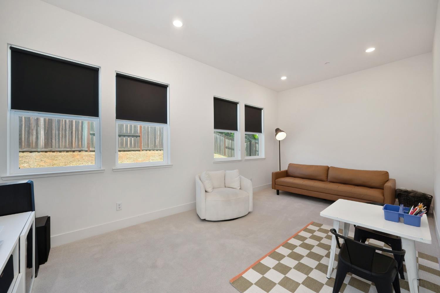 5085 Pryor Drive Rescue, CA 95672 - Photo 40 of 50 a living room with furniture and flat screen tv