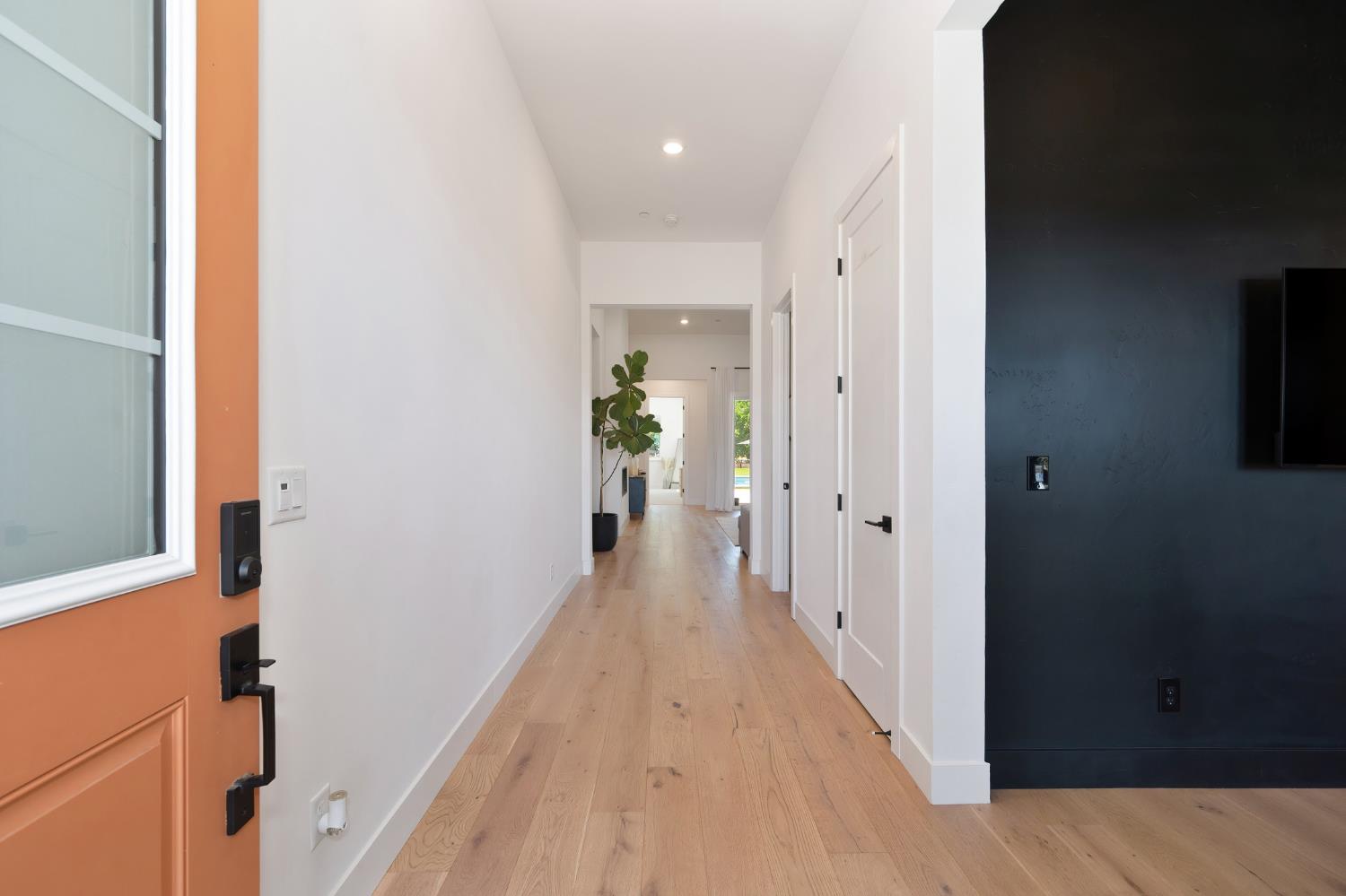 5085 Pryor Drive Rescue, CA 95672 - Photo 4 of 50 a view of a hallway with wooden floor and staircase