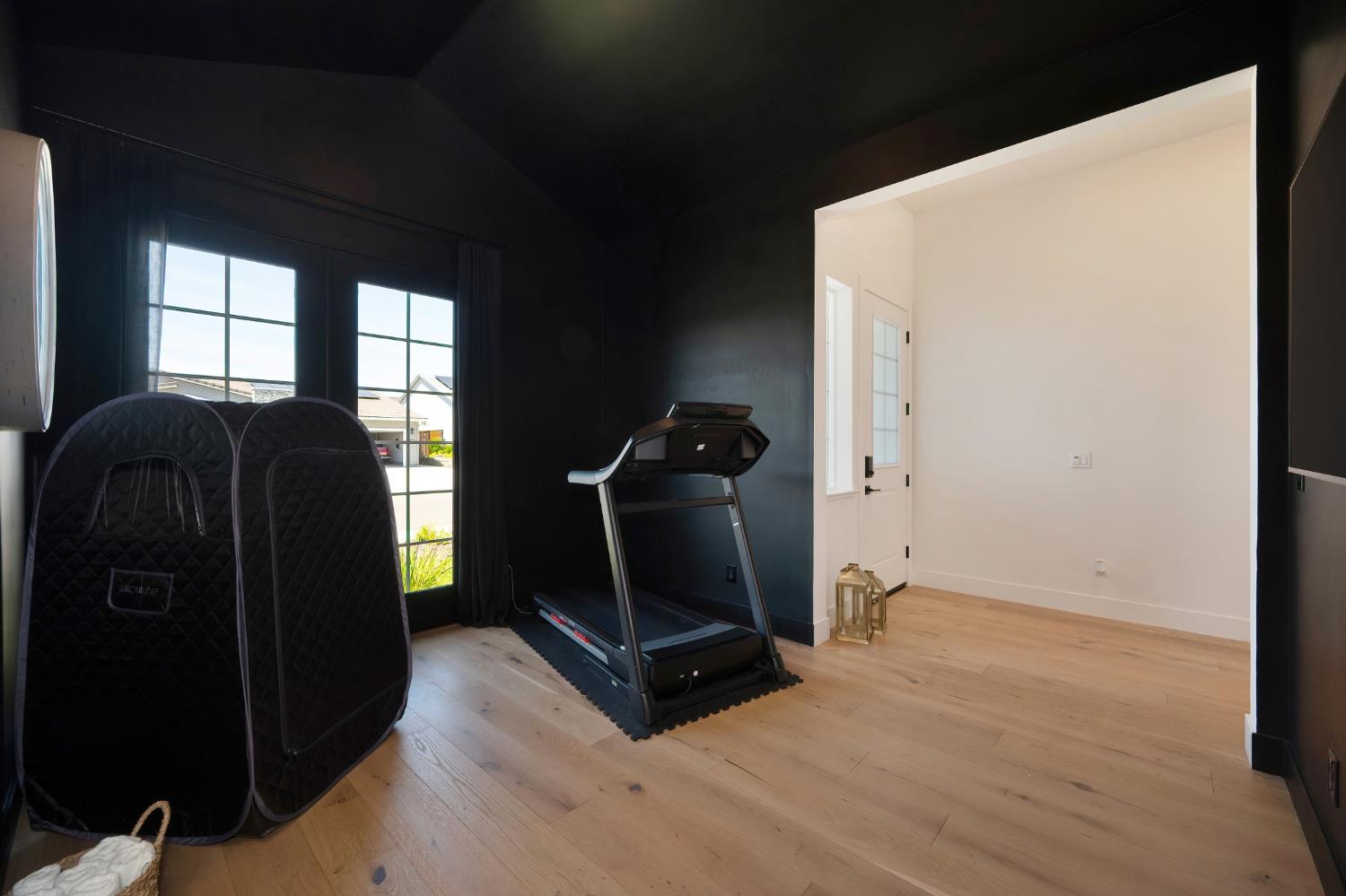 5085 Pryor Drive Rescue, CA 95672 - Photo 7 of 50 a room with gym equipment and a view of living room