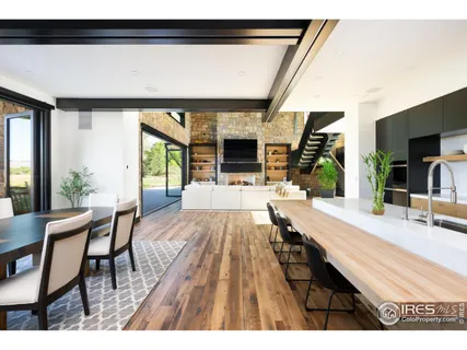 a bedroom with a large bed and a large window