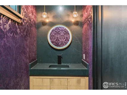 a view of living room with furniture and fireplace
